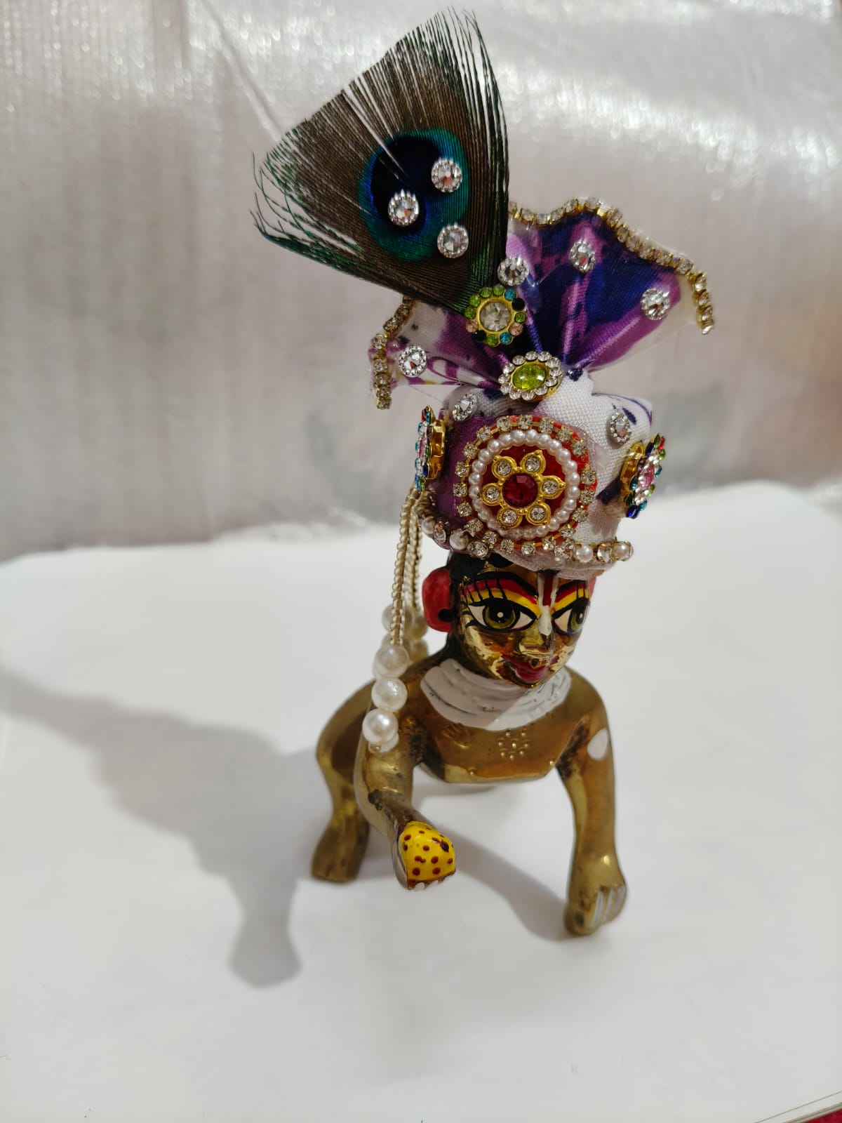 Beautiful white mullti feather dress with satin flowers